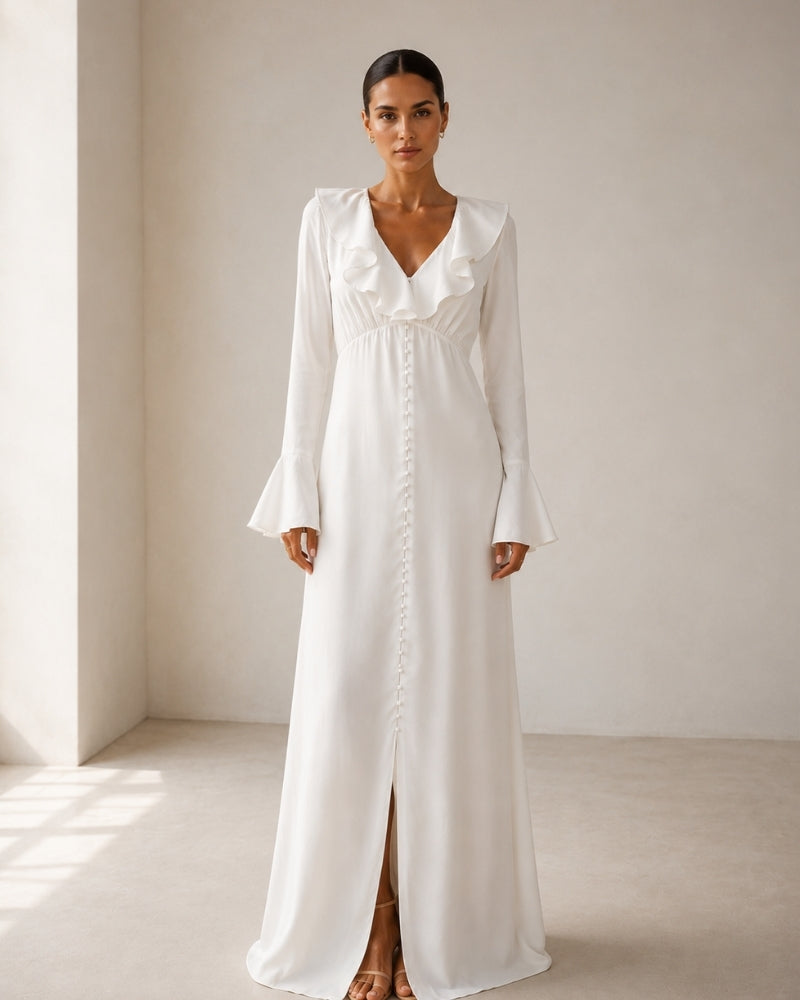 Vestido midi con volantes y botones de perla